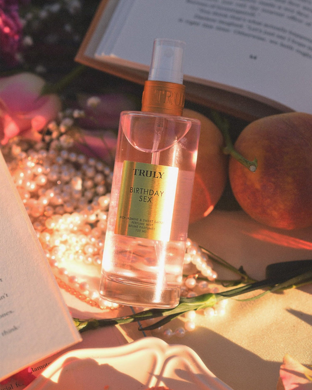 Truly Birthday Sex Perfume Mist apply-on-skin demonstrates smooth, silk-like feel.