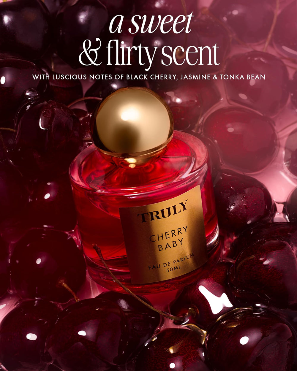Truly Cherry Baby EDP bottle closeup highlighting rich black cherry notes.