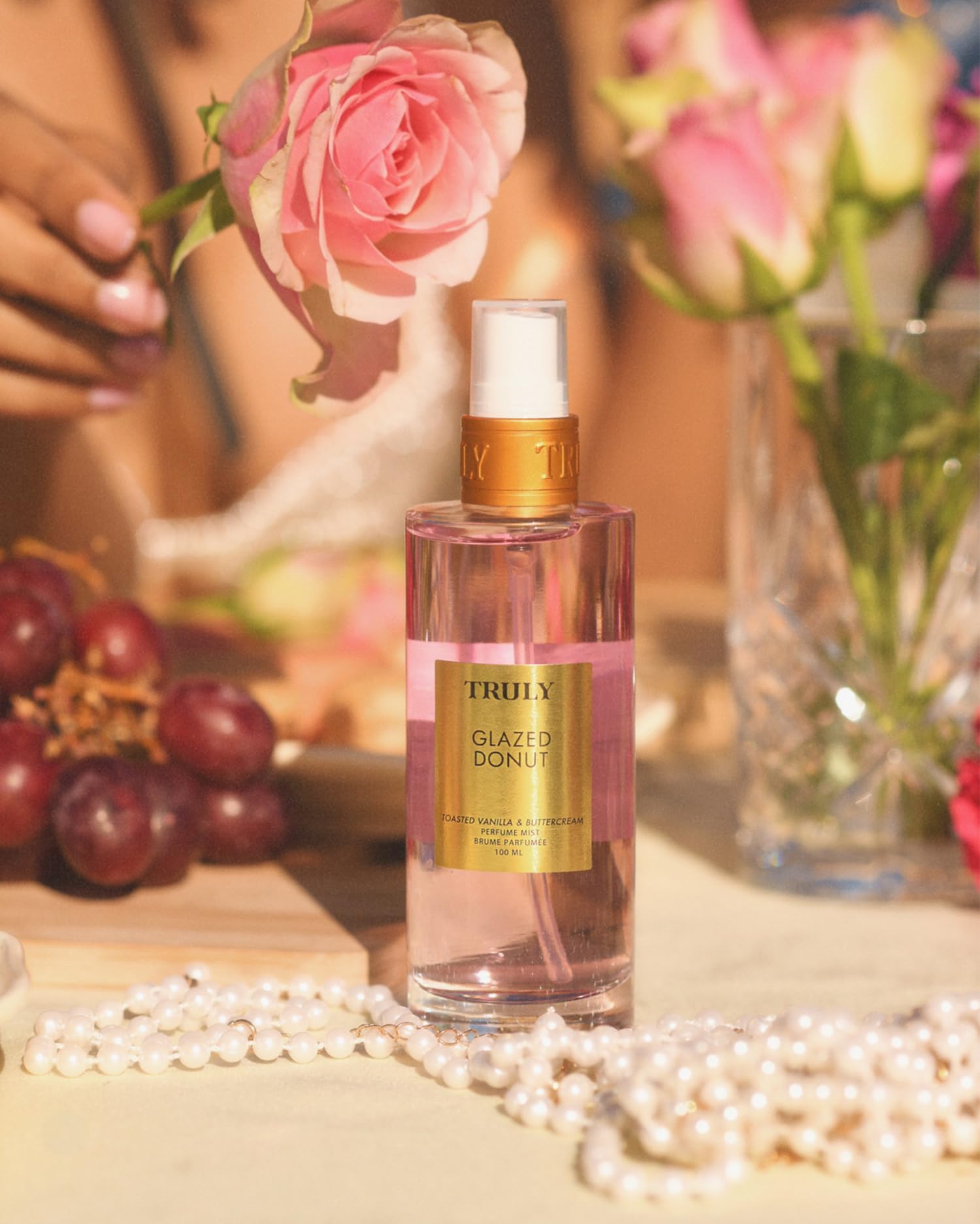 Truly Glazed Donut Perfume Mist side shot highlights bottle silhouette.