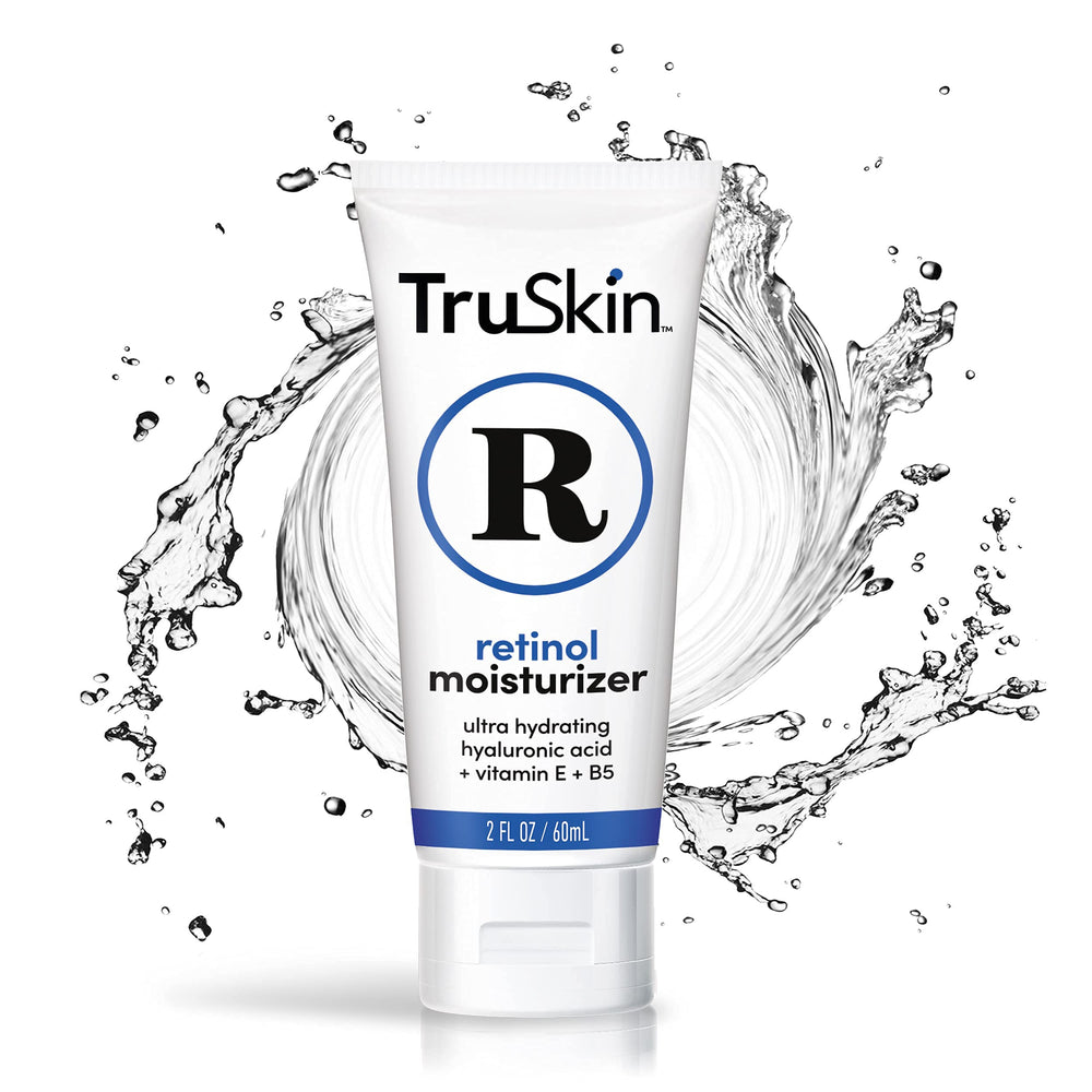 Applying TruSkin moisturizer on the face as part of nightly routine