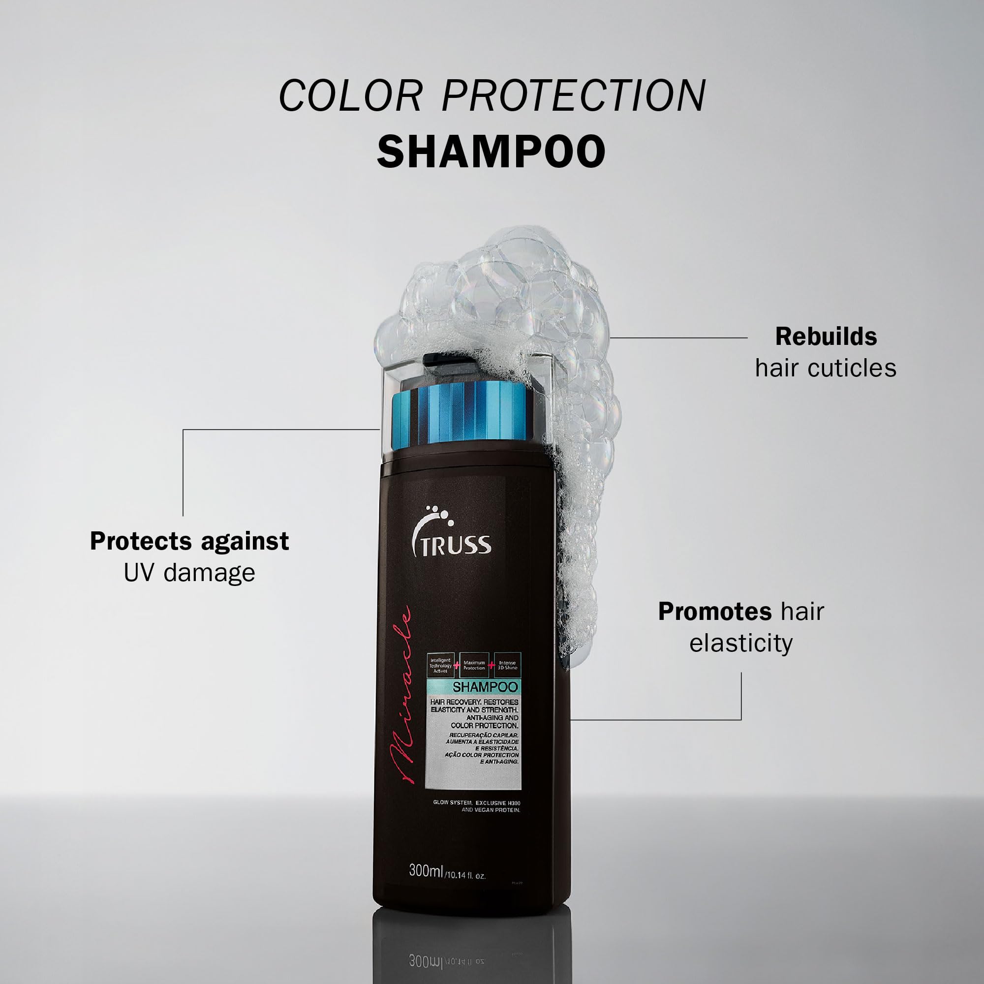 TRUSS Miracle Hair Shampoo label close-up emphasizes keratin and Vitamin E benefits.