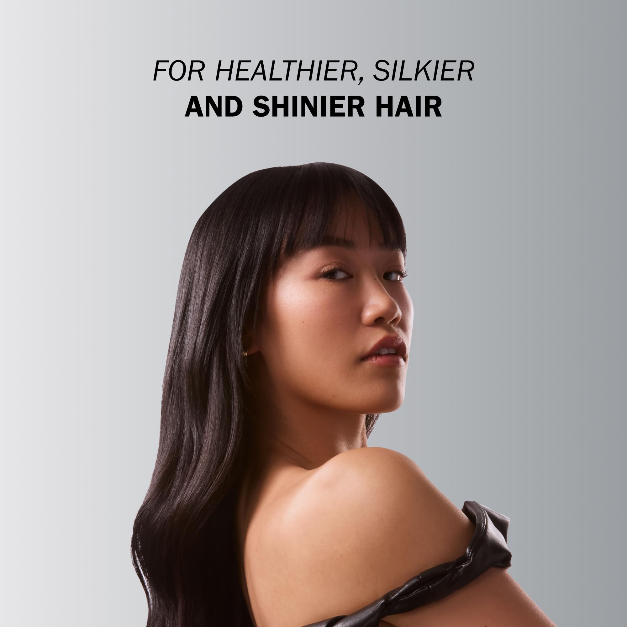 TRUSS Moisturizing Shampoo bottle with gentle lather demonstrates cleansing for sensitive hair.