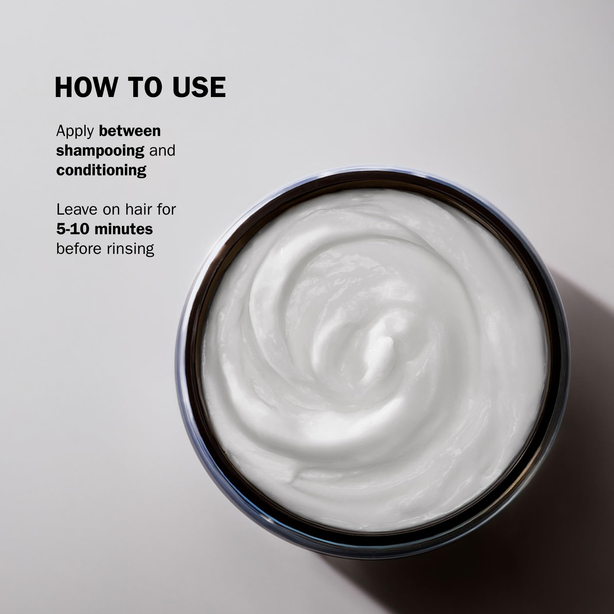 TRUSS Net Deep Conditioning Hair Mask hands applying to wet hair demonstrates usage