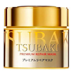 TSUBAKII Premium Repair Mask 180g hair application demonstrates moisturizing treatment for smooth hair.