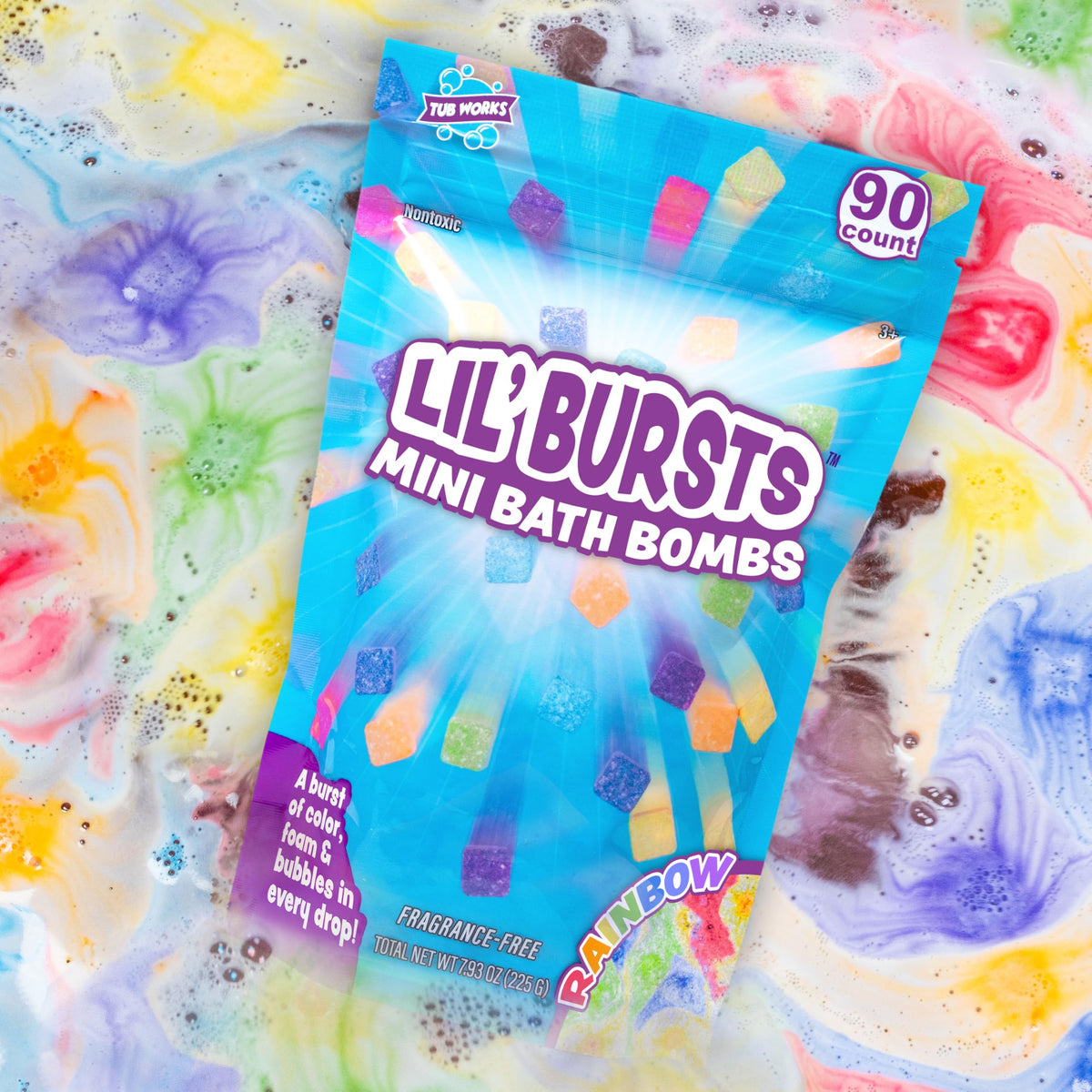Tub Works Lil' Bursts rainbow bath bombs coloring the tub for kids.