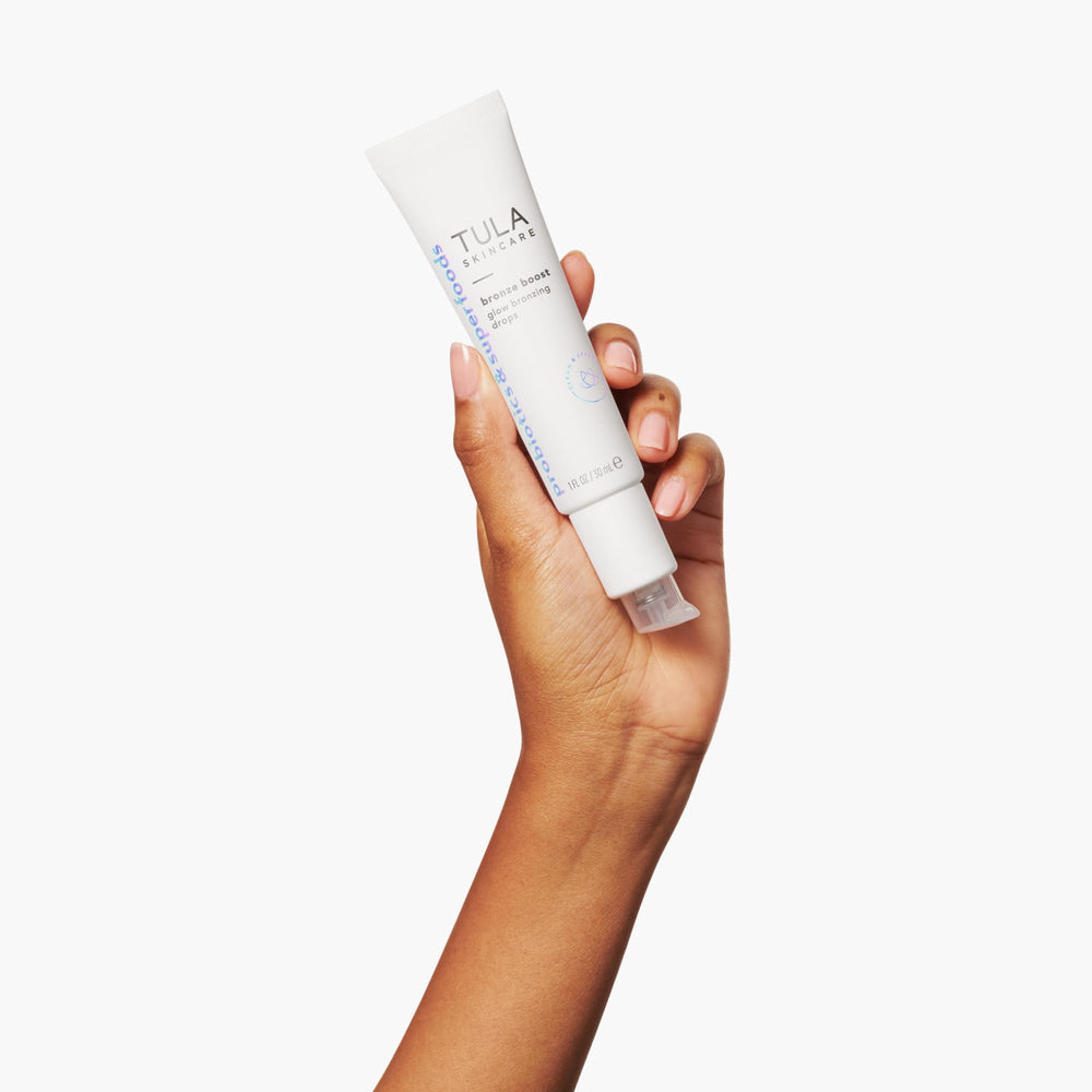 Product applied on hand shows natural glow and blendability.