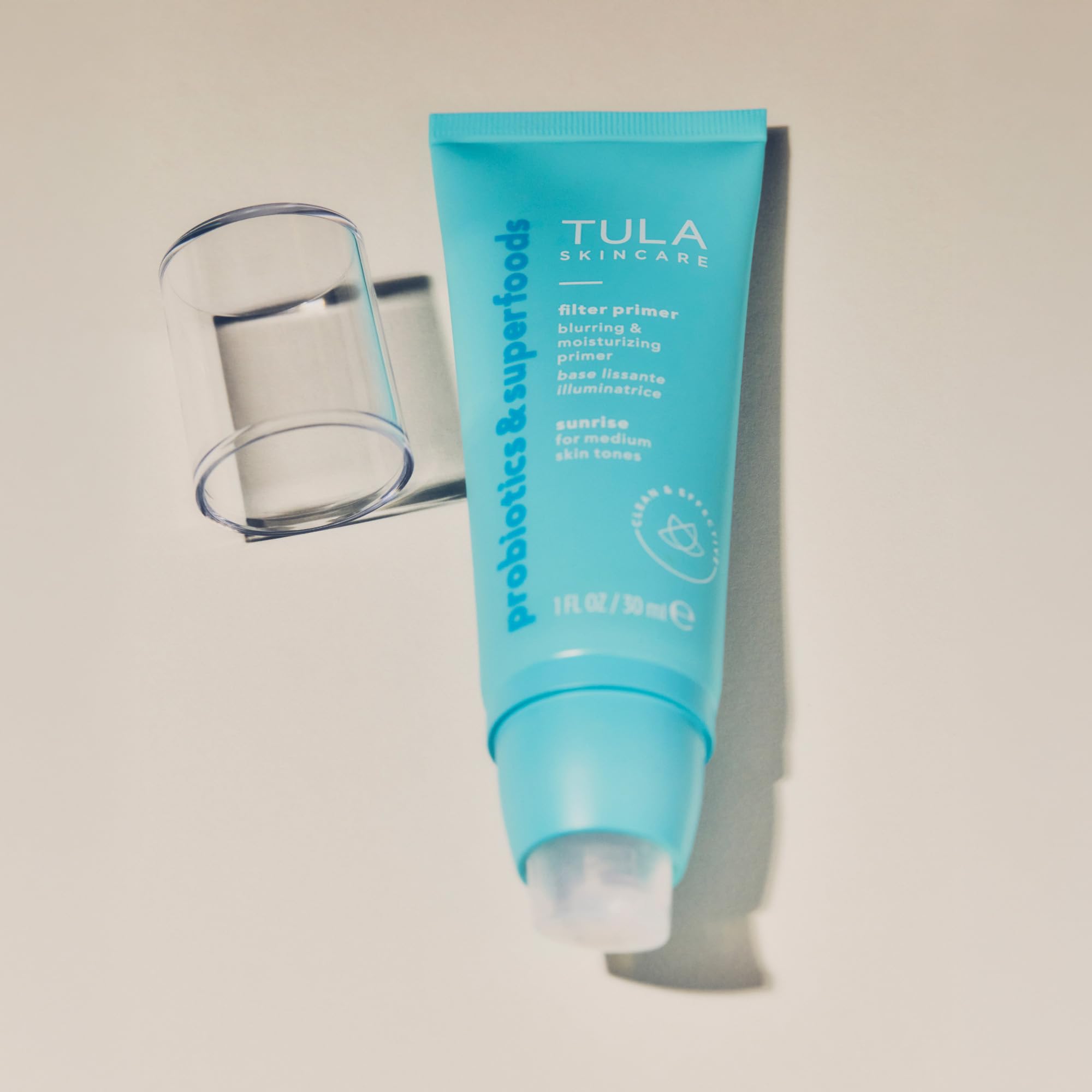 TULA Cosmos Face Filter Primer pump dispenser in use