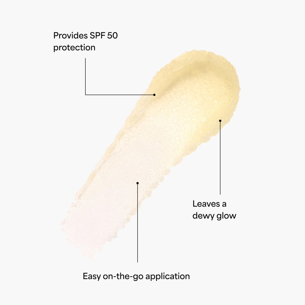 Hands applying TULA Protect + Glow sunscreen stick for mess-free use