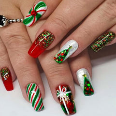 TULOBI Christmas nails with tree design and glitter for a festive look.
