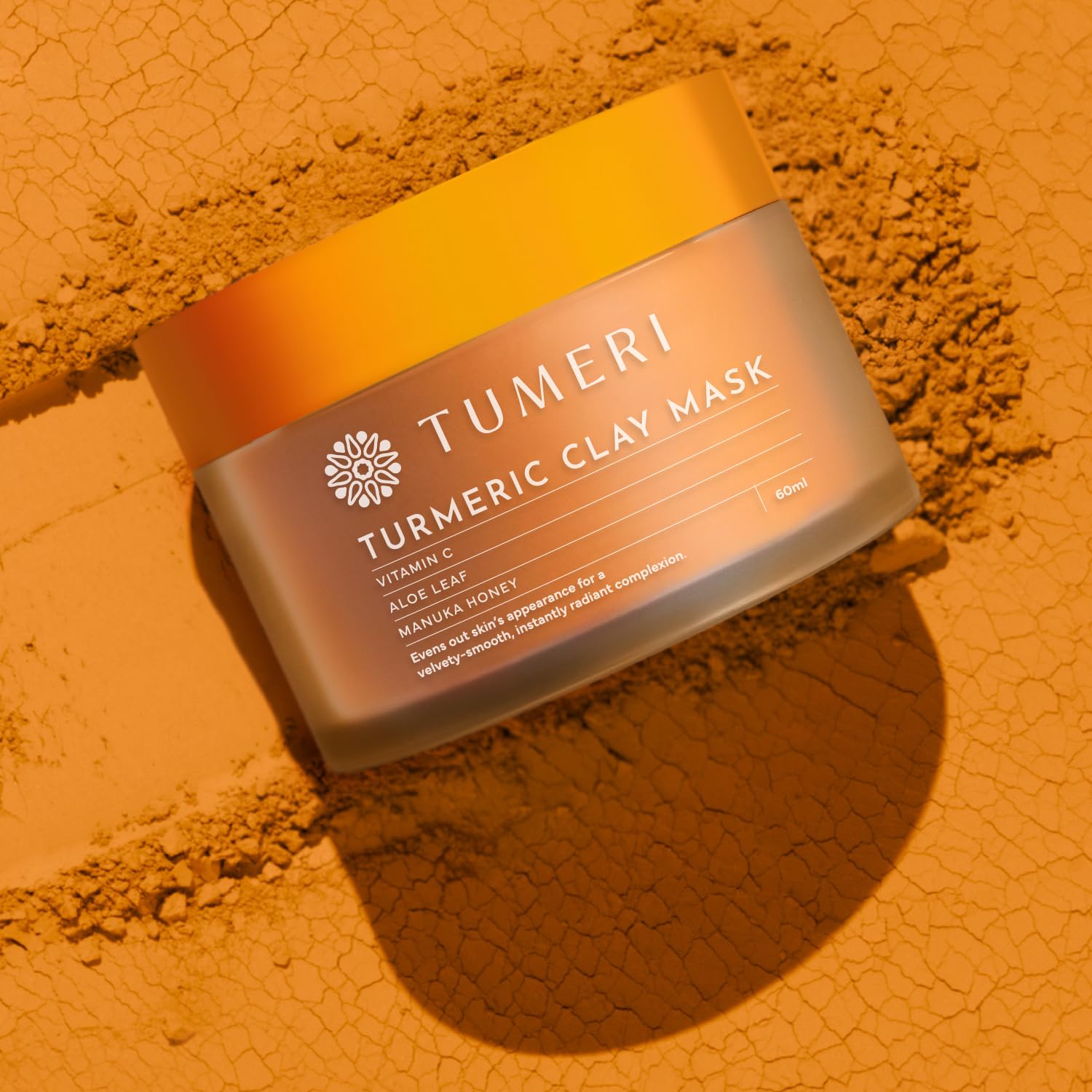 TUMERI Turmeric Vitamin C Clay Mask close detail highlighting creamy consistency.