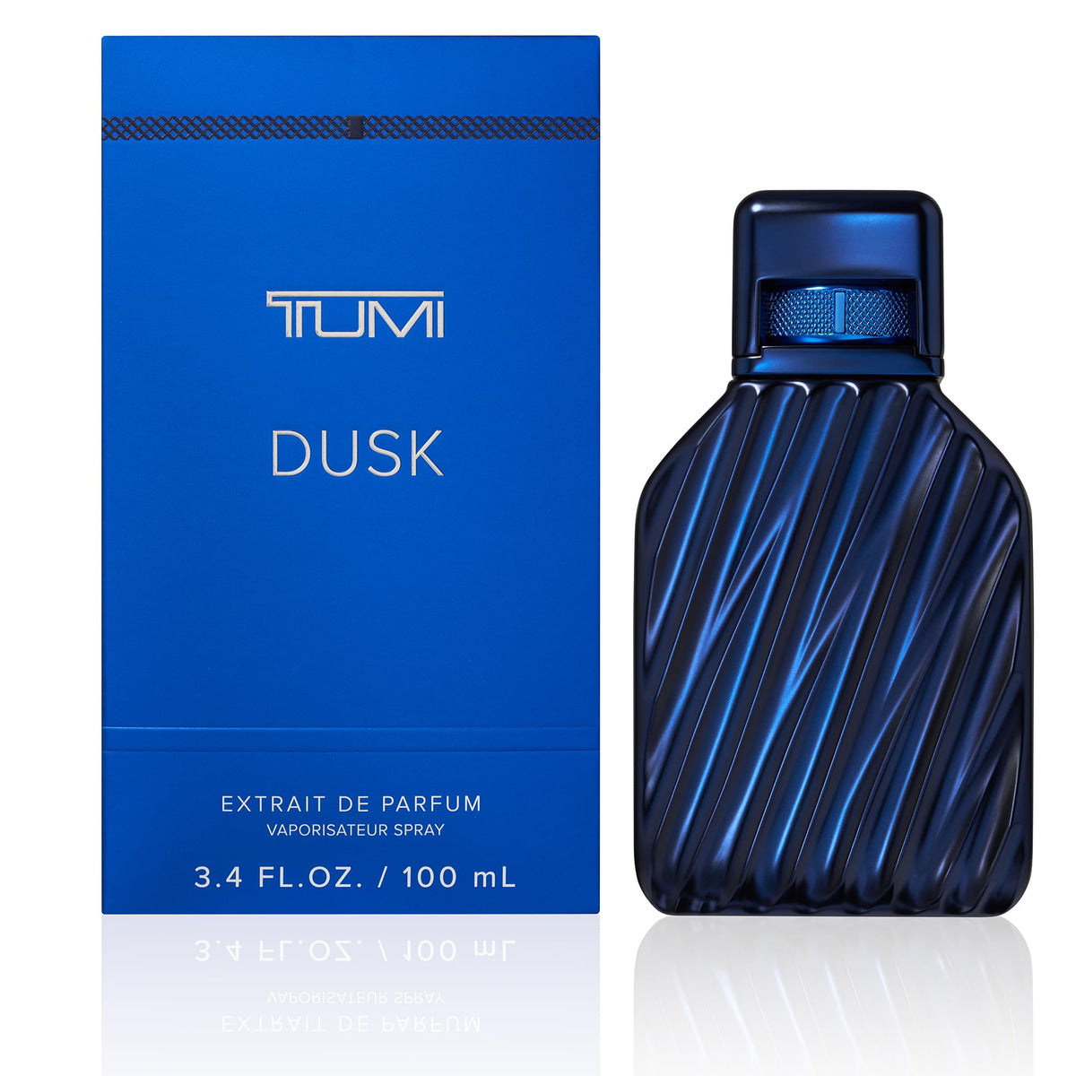 TUMI DUSK bottle reveals a woody aromatic fragrance profile for confident daily wear.
