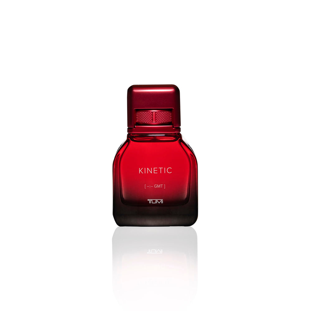 TUMI KINETIC close-up cap highlighting premium detailing and control.