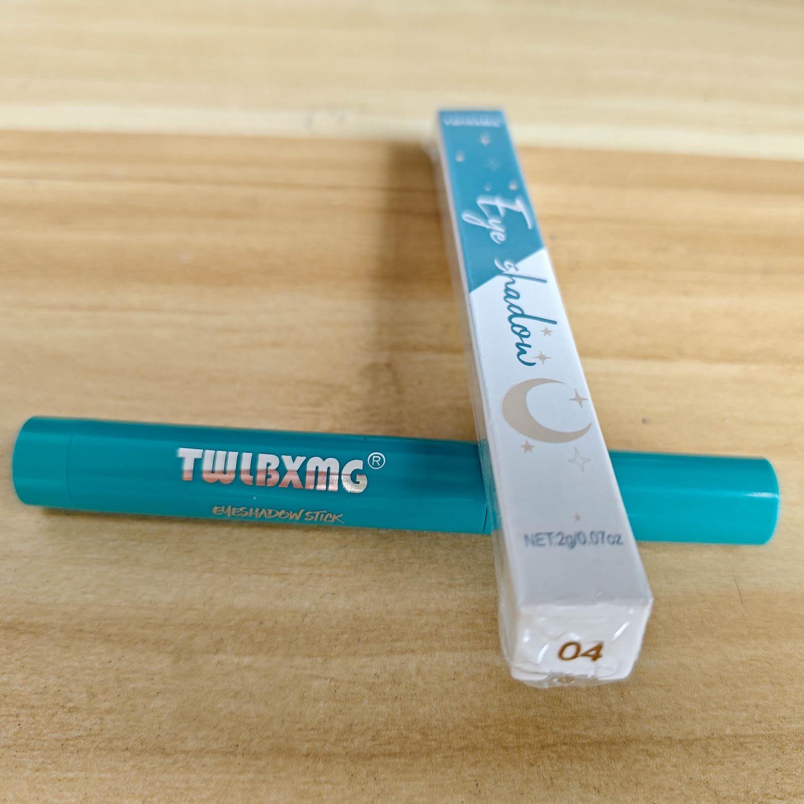 TWLBXMG Eyeshadow Stick in taupe mauve shimmer adds subtle dimension.
