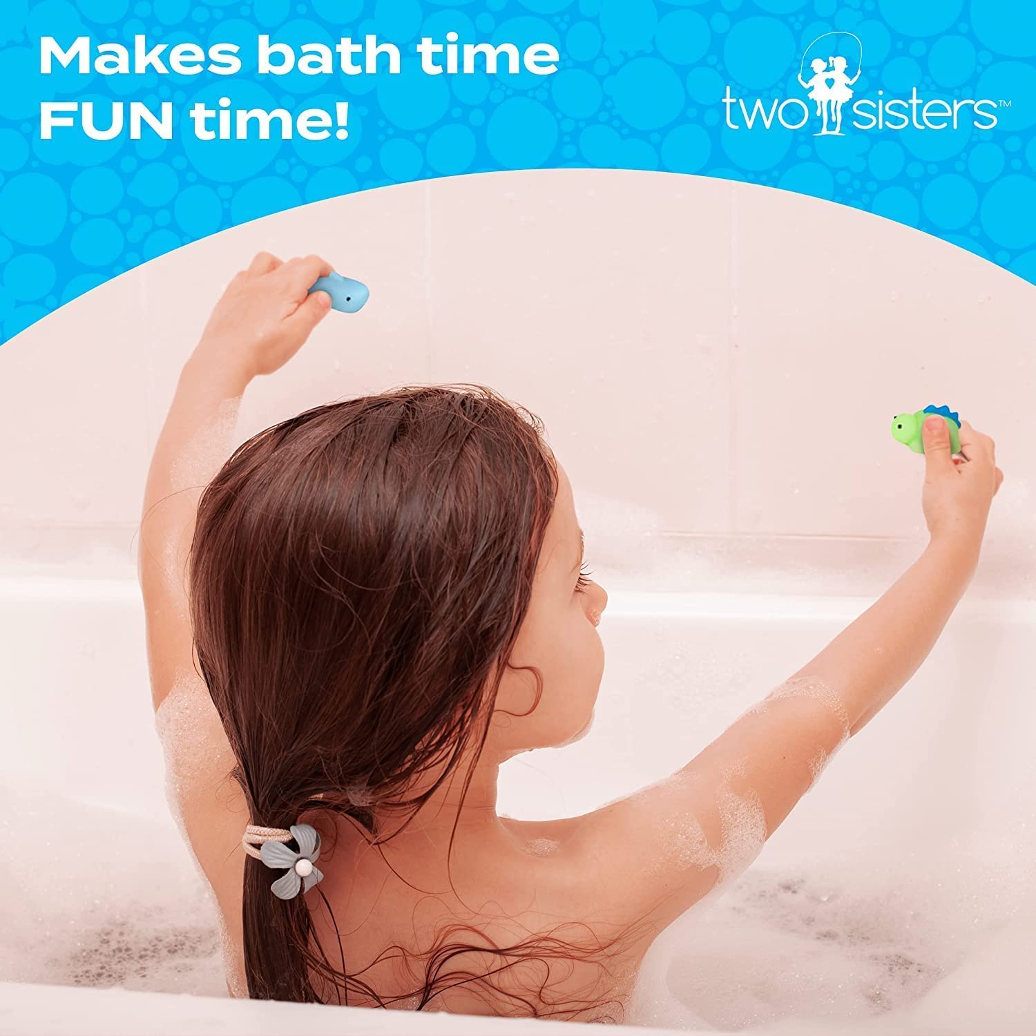 Two Sisters Mystical bath bomb reveals shark toy amid vivid fizz and color.