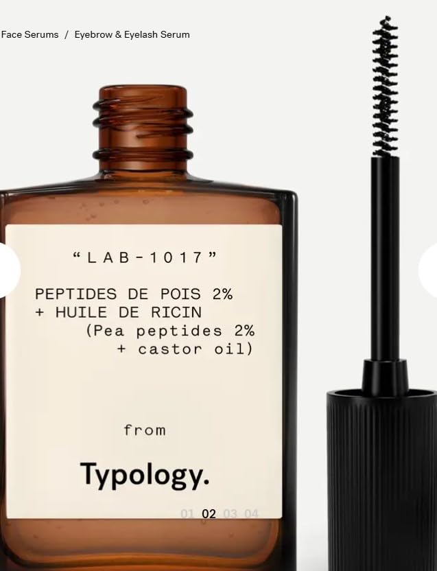 Typology eyelash serum applicator brush displayed for precise brow and lash styling.