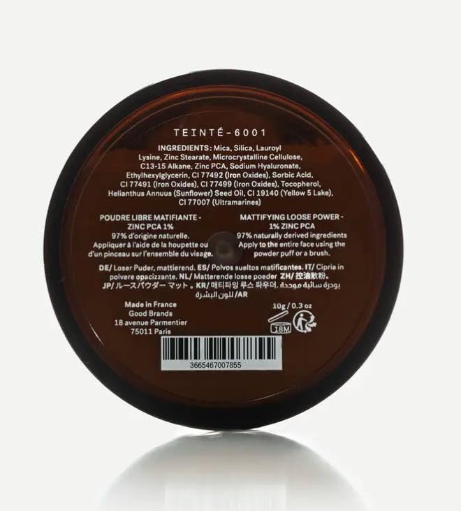 Typology loose powder applied for a long-lasting natural matte finish.