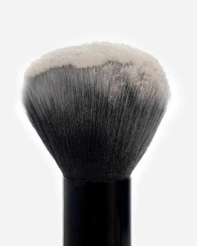 Typology talc-free powder close-up highlighting a clean silicone-free formula.