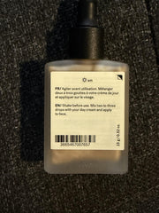 Typology Paris Glow Drops packaging emphasizes vegan formula and French craftsmanship.