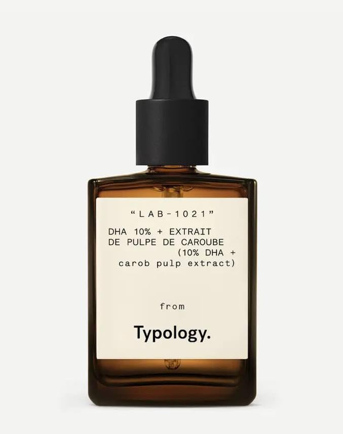 Typology self-tanning serum bottle with clear formula for natural, UV-free color.