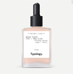 Typology tinted serum bottle with vitamin C for a radiant, natural glow