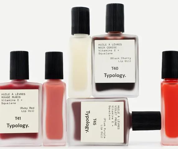 Typology vegan, France-made lip oil packaging on display.
