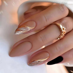 Tyuimhx almond press nails with brown marble and gold line, ideal for chic party looks.