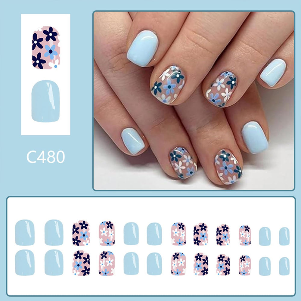 Tyuimhx glossy blue floral press-on nails demonstrating a polished, salon-like finish.