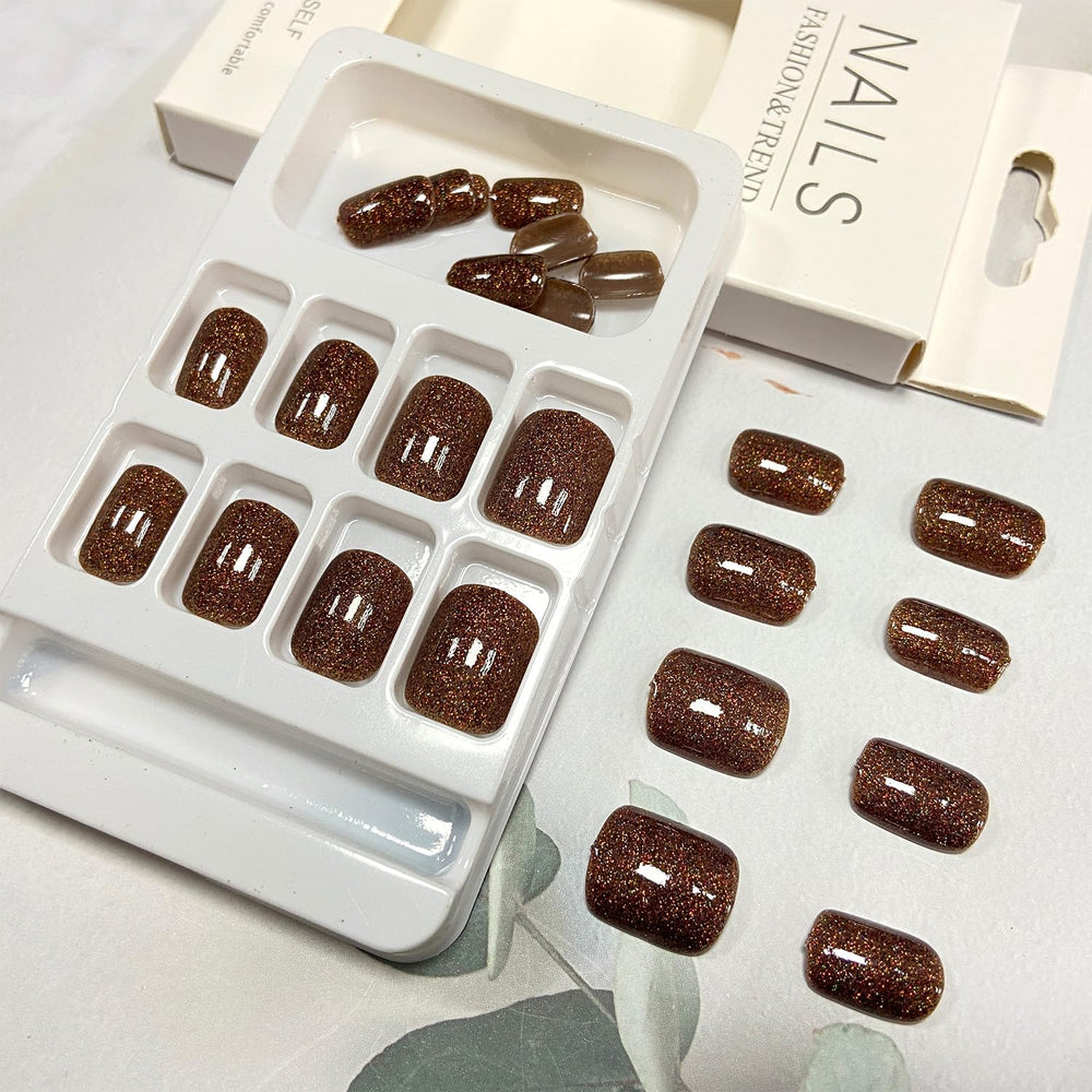 Tyuimhx brown glitter square nails gift idea in elegant packaging.