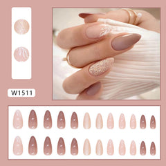 Tyuimhx glitter leaf nails in compact packaging, ready for quick party finger glam.