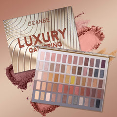 UCANBE palette open swatches reveal 60 shades with matte, satin, pearl, and metallic finishes.
