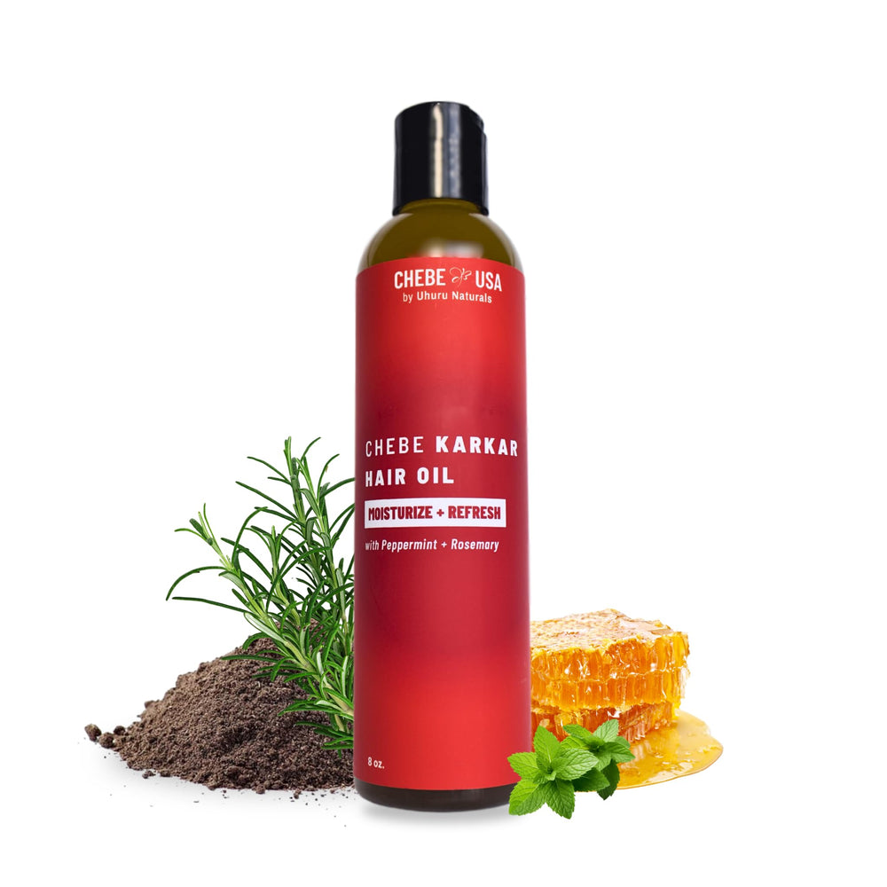 Uhuru Naturals Original Chebe Oil bottle pouring to nourish hair moisture and strength