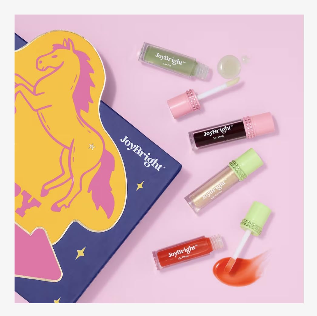 Ulta Beauty Lip Glossary Rodeo lip toppers add sparkle and depth.