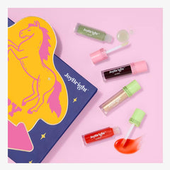 Ulta Beauty Lip Glossary Rodeo lip toppers add sparkle and depth.