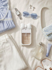 ULTRASKINX Ribbon Bow Case snug-fit 1oz sanitizer, easy to carry.