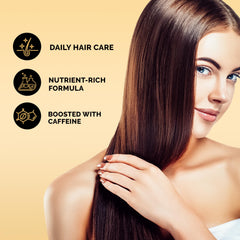 Serum drop from Hair Plush on fingertip, ready to apply
