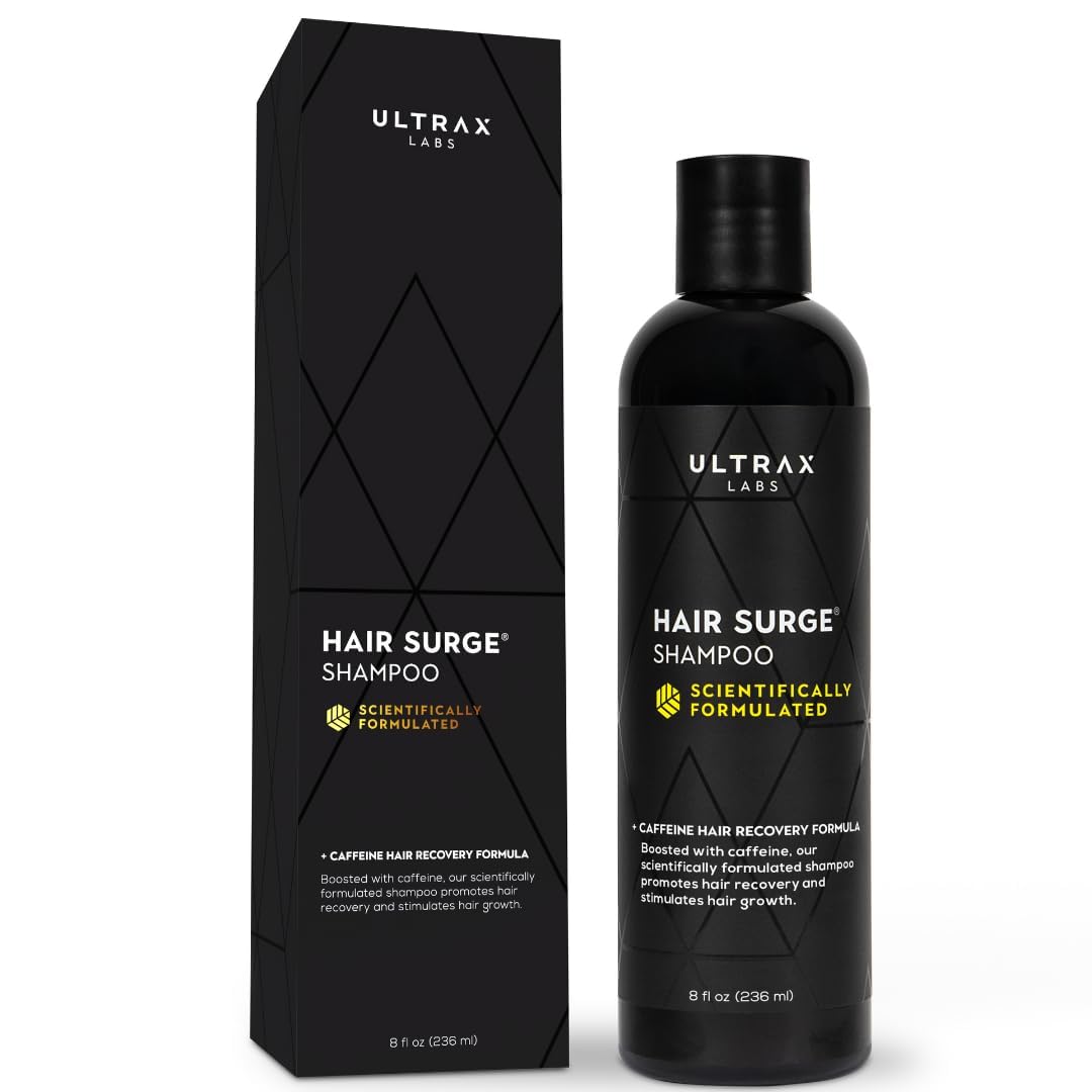 Ultrax Labs Hair Surge bottle pouring, caffeine-rich formula for thicker-looking hair.