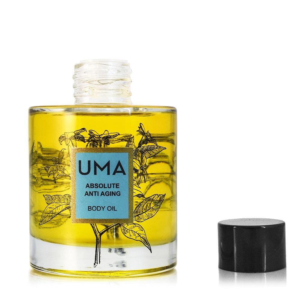 UMA Absolute Anti-Aging Body Oil bottle pour, fast-absorbing hydration without greasiness.