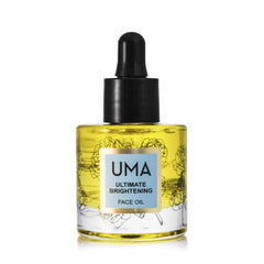 UMA Organic Ultimate Brightening Face Oil bottle demonstrates premium hydration for dry skin.