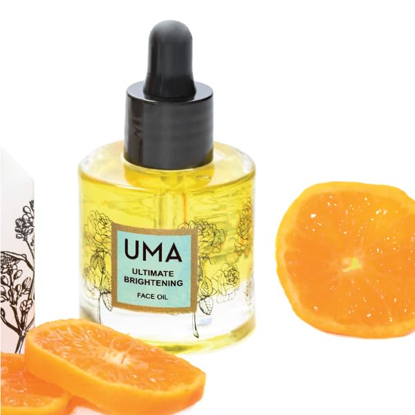 UMA Organic Ultimate Brightening Face Oil dropper in use highlights easy application for even tone.