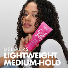 Damp hair with Curl Jelly being scrunched for smooth texture and shine.