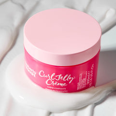Umberto Giannini Curl Jelly applied to damp hair for curl definition.