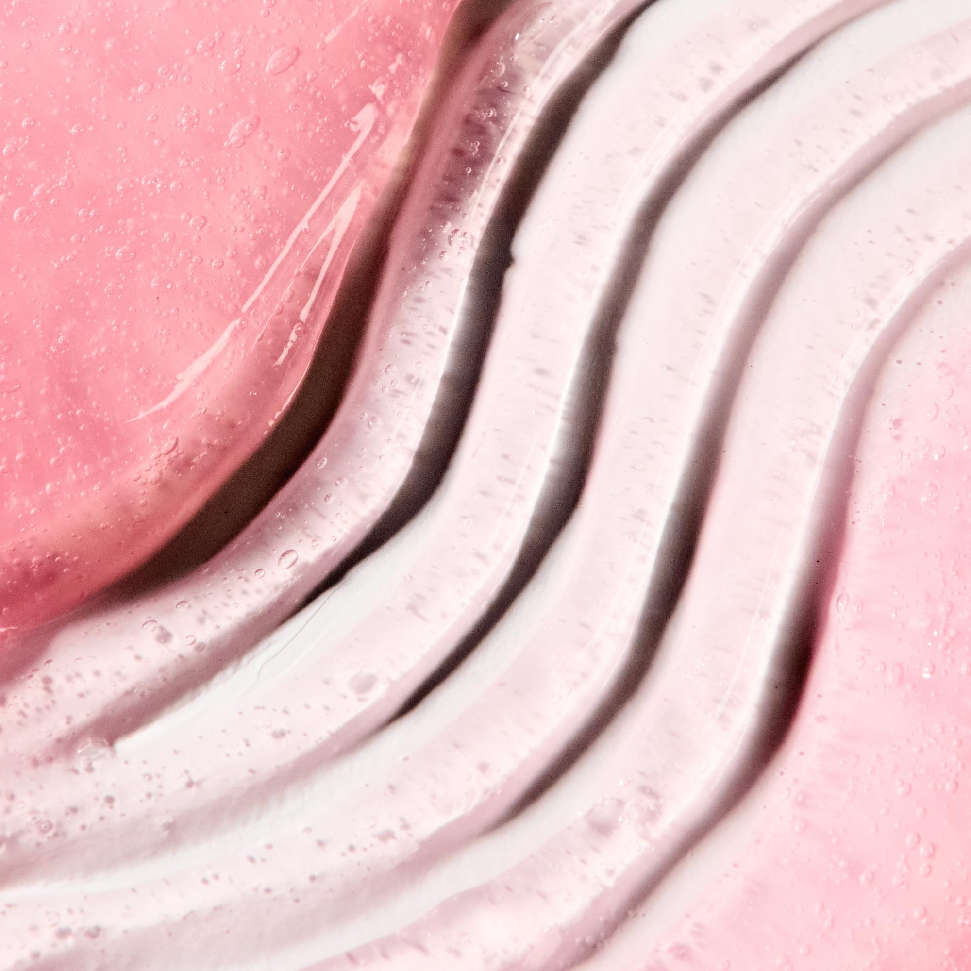 Travel-friendly Umberto Giannini Curl Jelly bottle for on-the-go styling