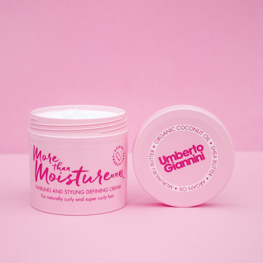 Hair with defined curls and soft shine using Umberto Giannini More Than Moisture Cream.