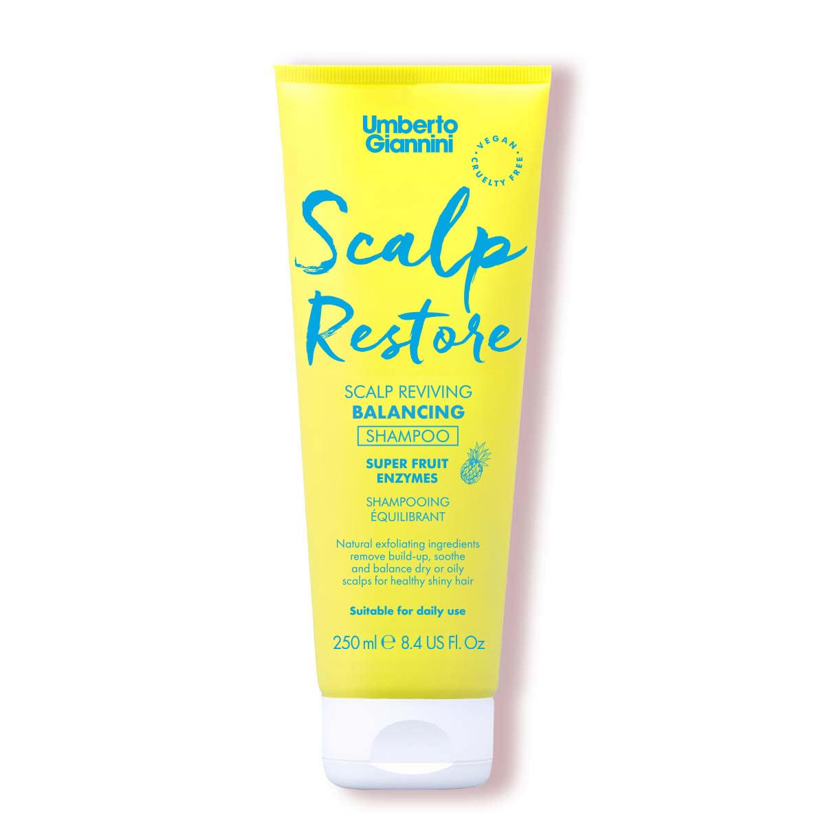 Umberto Giannini Scalp Restore bottle pouring to balance the scalp.