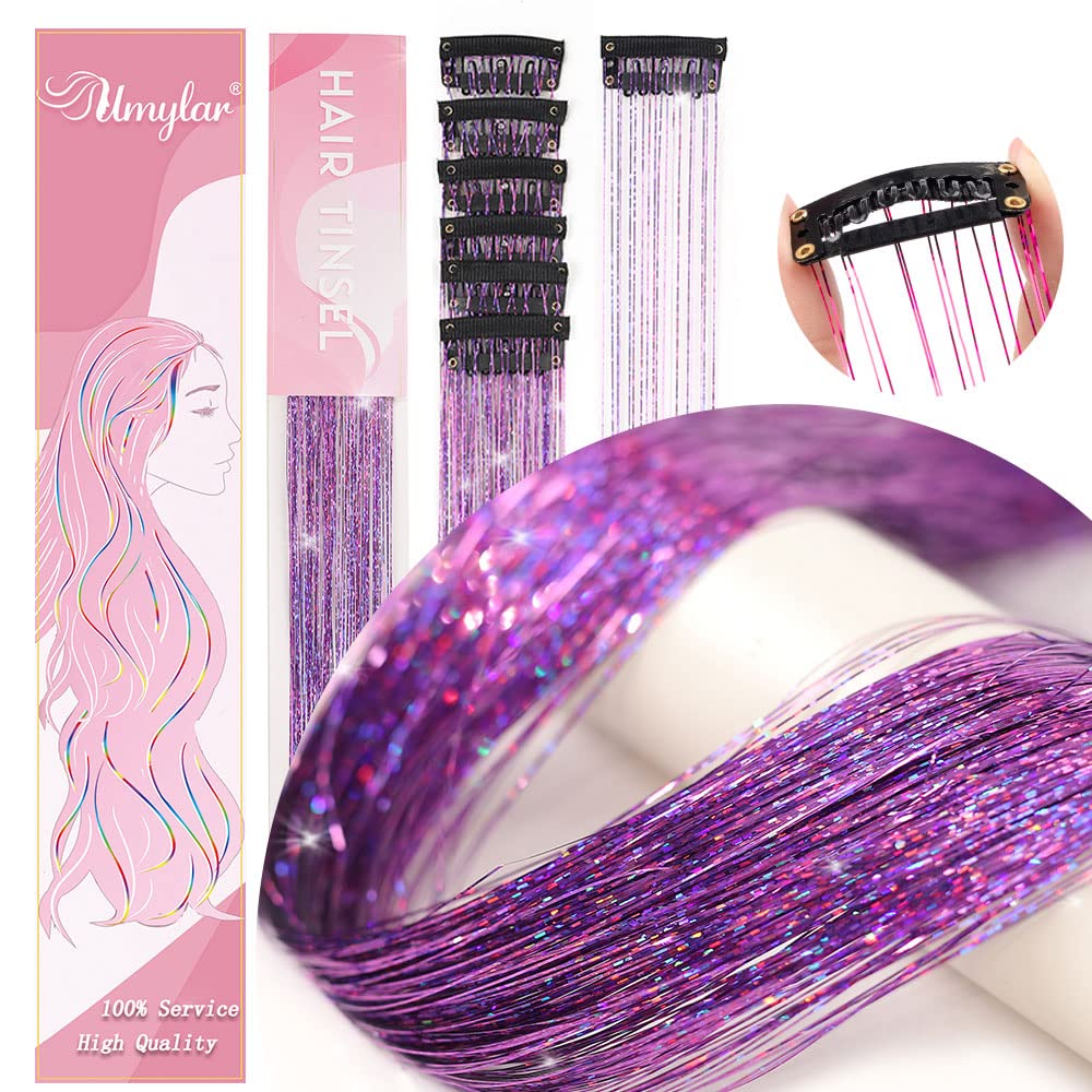 Umylar festival purple tinsel clip-in extensions brighten party looks with quick, temporary shine.