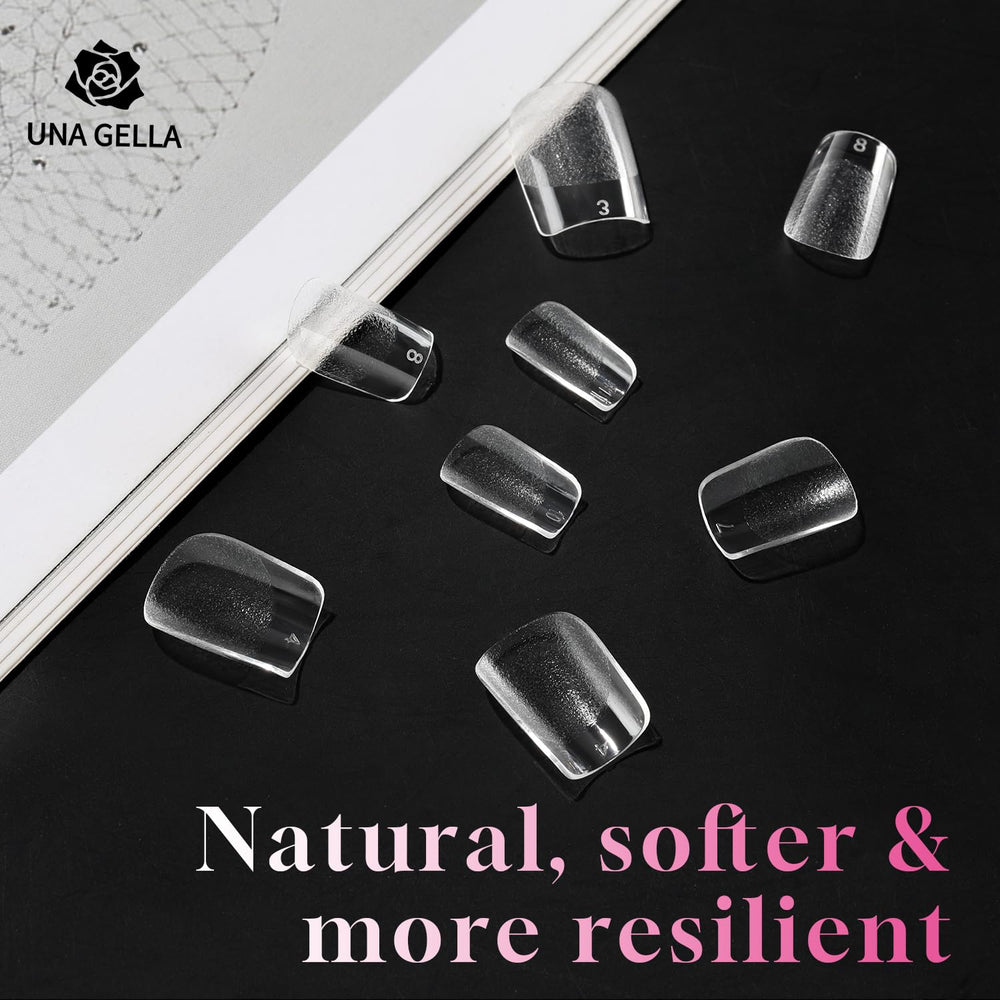UNA GELLA transparent tips applied with soft gel for lasting wear.