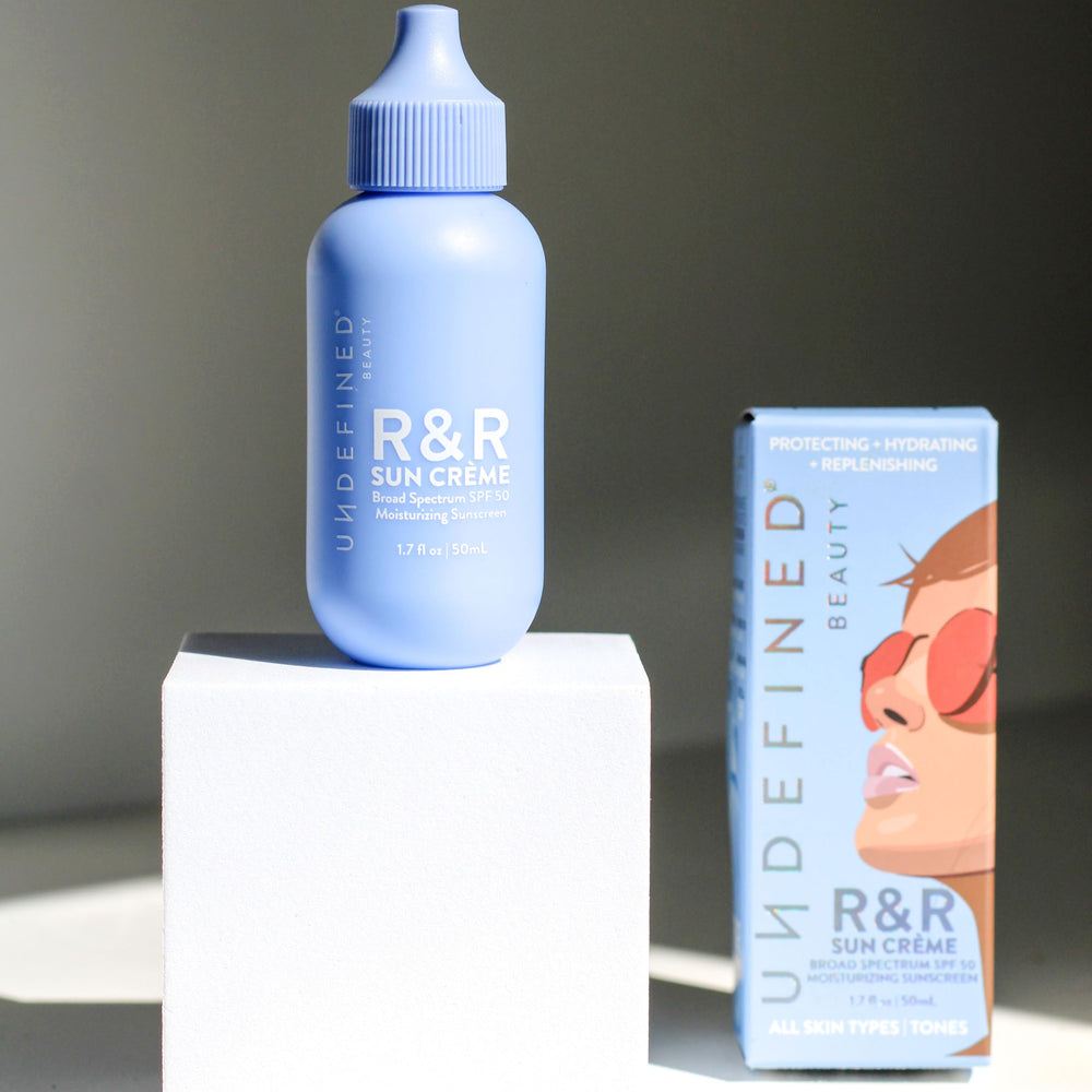 Undefined Beauty R&R Sun Crème SPF 50 bottle label highlights gentle skincare ingredients.