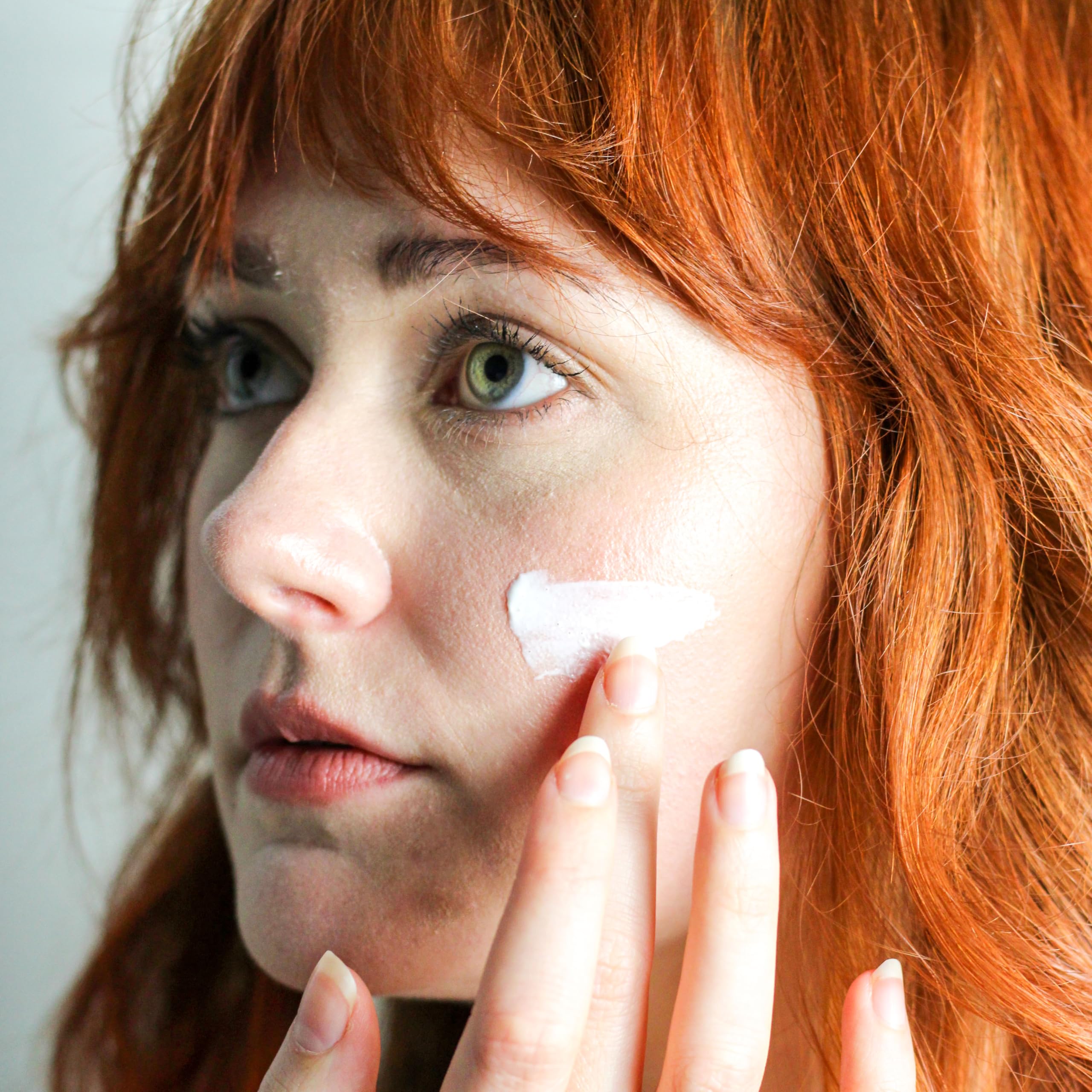 Undefined Beauty R&R Sun Crème SPF 50 texture swirl indicates creamy, non-greasy finish.
