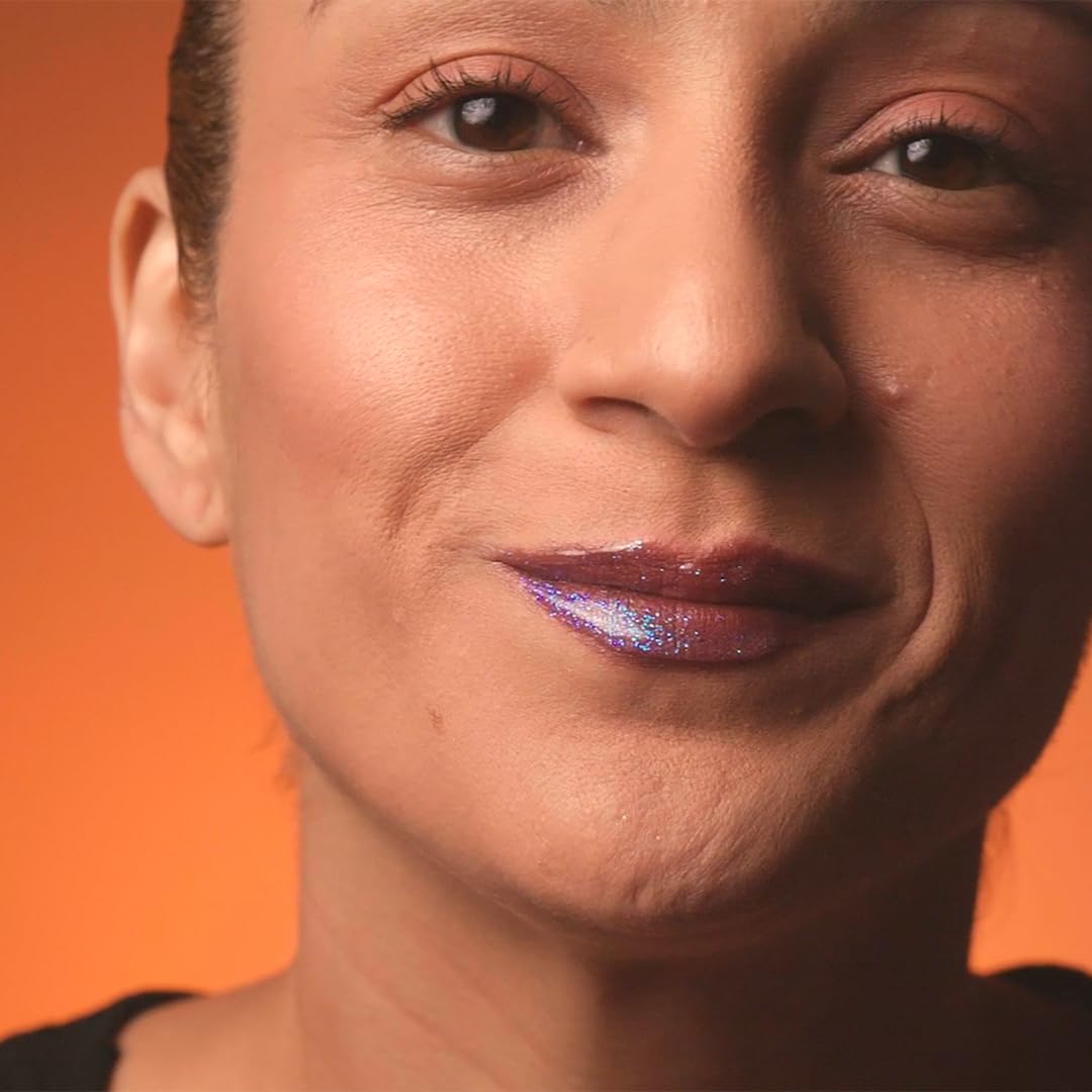 Unicorn Snot Glitter Boss lip swatch showing holographic shimmer on skin.