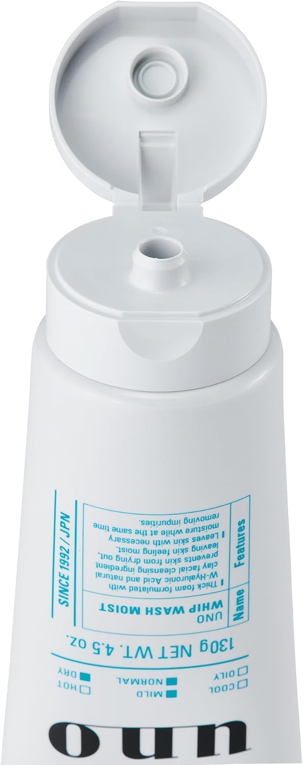 Texture closeup reveals micro-scrub beads for gentle exfoliation.